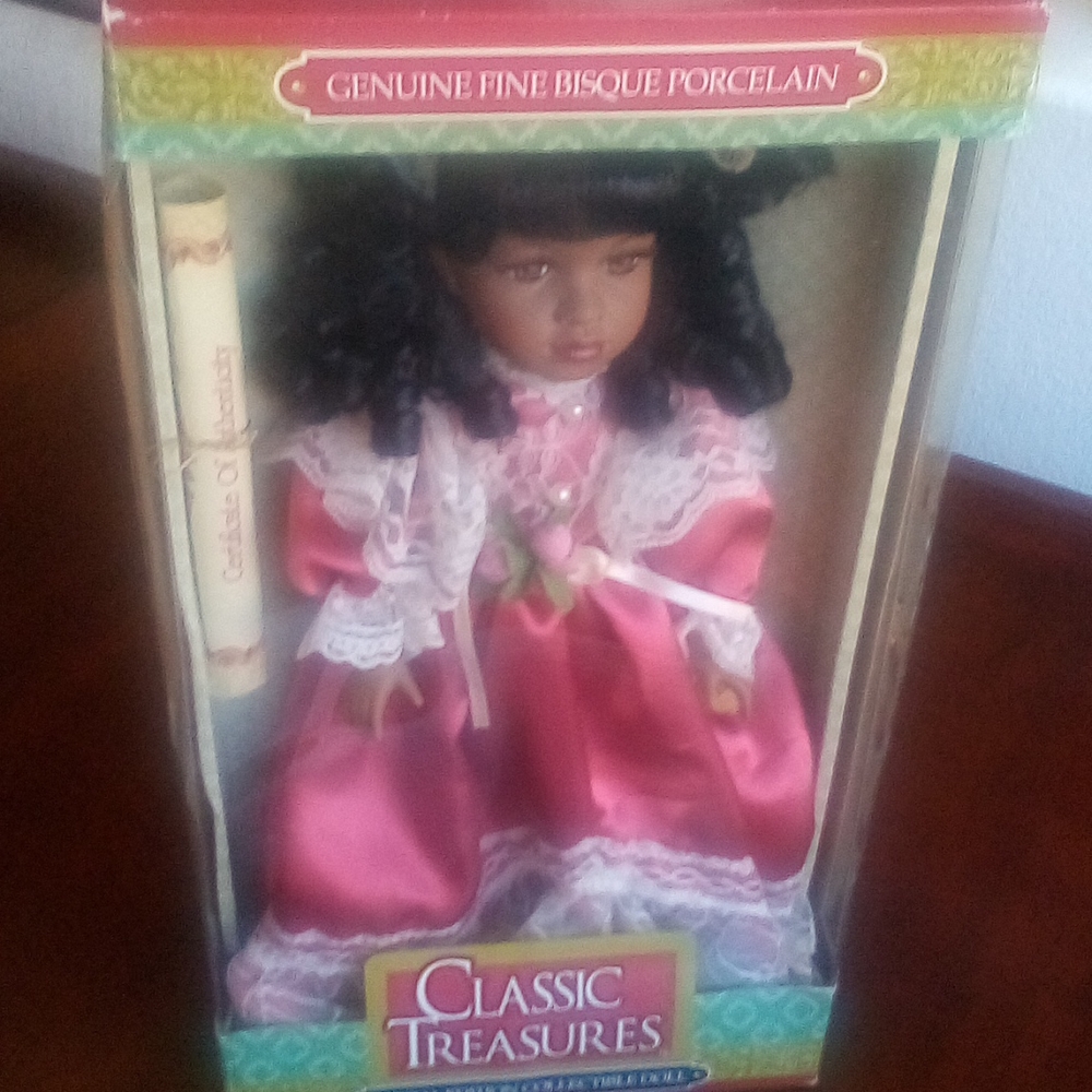 Genuine fine porcelain doll